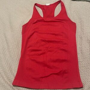 Hot Pink Fabletics Racerback workout top, size small